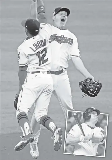  ?? N.Y. Post: Charles Wenzelberg; Getty Images ?? DEAL WITH IT: Ex-Met Jay Bruce (right), who was nearly traded to the Yankees, celebrates with Francisco Lindor after his three RBIs, including a two-run homer (inset), helped the Indians to a 4-0 win in Game 1 of the ALDS on Thursday.