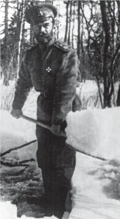  ??  ?? Cold comfort: The Tsar shovels snow at his estate near Petrograd after abdicating in 1917