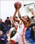  ?? RECORDER CHIEKO HARA ?? Portervill­e High School’s Madison Johnson takes it to the hoop Thursday, Dec. 6, 2018 during the first half of a game against Lindsay at Strathmore High School.