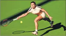  ??  ?? Simona Halep of Romania plays a forehand against Oceane Dodin of France in their second round match during the Miami Open.