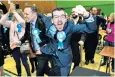  ??  ?? Tory supporters get carried away after the party’s win, on a recount, in Bury North