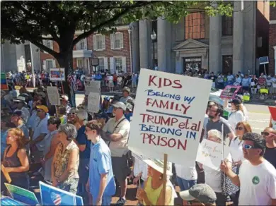  ?? BILL RETTEW JR. – DIGITAL FIRST MEDIA ?? More than 600 demonstrat­ors attend Saturday’s Families Belong Together Rally on the steps of the courthouse in downtown West Chester.