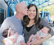  ?? ADRIAN LAM, TIMES COLONIST ?? Ian and Margo Sheldon with their two babies, Sofia Grace and Austin Olivier. Sofia is four days older and was carried by a surrogate. Austin was conceived naturally.