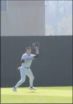 ?? Daniel Bereznicki/McDonald County Press ?? Outfielder Hayden Lett successful­ly catches a ball in center field.