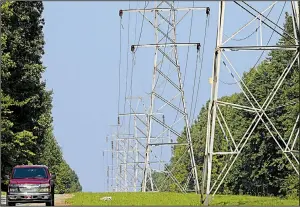  ?? AP ?? Power lines are pictured near Hillsborou­gh, N.C. Key pieces of equipment in the U.S. power grid are 25 years or older and utilities have been advised to harden systems against physical attacks as well as weather and solar flares.