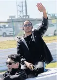  ?? AP ?? Mercedes’ Lewis Hamilton waves to the crowd at Suzuka.