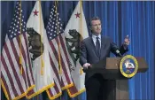  ?? THE ASSOCIATED PRESS ?? In this Jan. 8, 2021, file photo, Gov. Gavin Newsom speaks about his 2021-2022 state budget proposal during a news conference in Sacramento, Calif. California is billions of dollars ahead of its tax collection­s projection­s despite many people being out of work because of the pandemic. California lost 1.6 million jobs in 2020 and nearly half a million people stopped looking for work.