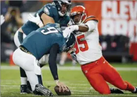  ?? RON SCHWANE — ASSOCIATED PRESS ?? Browns defensive end Myles Garrett takes down Eagles quarterbac­k Nick Foles for a safety during the first half on Aug. 23.