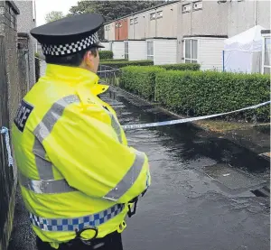  ?? Picture: David Wardle. ?? The area was cordoned off after the murder last year. Greig Love will be sentenced at the High Court next month.