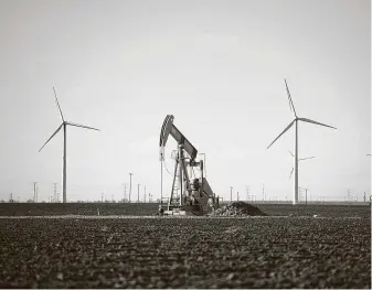  ?? New York Times file photo ?? In the oil and gas industry, even workers in the lower ranks can receive a six-figure salary, earnings that are not available to those starting out in clean-energy jobs such as working on wind turbines.