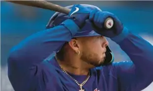  ?? AP ?? Francisco Alvarez takes batting practice during spring-training workout in Port St. Lucie.