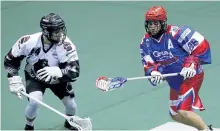  ?? CLIFFORD SKARSTEDT/EXAMINER FILE PHOTO ?? Peterborou­gh Century 21 Lakers player Shawn Evans and the Cobourg Kodiaks' Doug Utting chase down a loose ball during first period Major Series Lacrosse action on June 29 at the Memorial Centre. Don Barrie writes that the divide in MSL teams' skill...