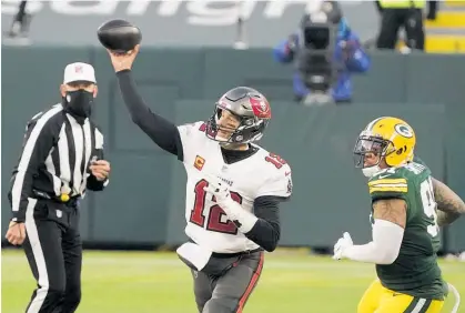  ?? Photo / AP ?? Tom Brady went 20 of 36 for 286 yards and three touchdowns as Tampa Bay beat Green Bay for a Super Bowl spot.