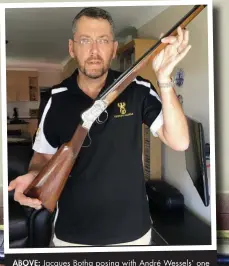  ??  ?? Jacques Botha posing with André Wessels’ one of a kind single-shot rifle in .22LR. MAIN PICTURE: The rifle is adorned with beautiful engraving – a pair of duiker on the right-hand side of the action.