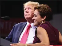  ?? MARIO TAMA — GETTY IMAGES ?? Former President Donald Trump embraces Republican candidate for governor Kari Lake at a “Save America” rally in support of Arizona GOP candidates on July 22in Prescott Valley, Arizona.