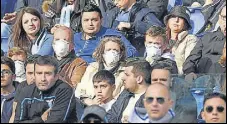  ?? REUTERS ?? Fans in attendance at the Lazio-bologna match in Serie A wear face masks due to the recent outbreak of coronaviru­s.
