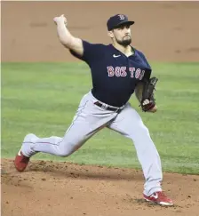  ?? Ap ?? SOLID SHOWING: Red Sox starter Nathan Eovaldi delivers a pitch in the first inning against the Marlins on Thursday afternoon in Miami.