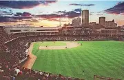  ??  ?? A sold-out crowd packed the opening of the Bricktown ballpark in 1998.