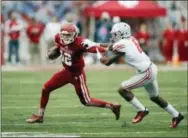  ?? DARRON CUMMINGS — THE ASSOCIATED PRESS ?? Ohio State’s Gareon Conley attempts a tackle against Indiana in October. The cornerback is Mel Kiper Jr.’s pick for the Eagles at No. 14 in the first round of the NFL Draft.