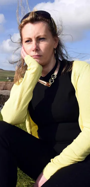  ??  ?? CERVICAL CHECK SCANDAL: Terminally ill Emma Mhic Mhathuna, pictured near her home in Ballydavid in West Kerry, last Thursday. Photo: Don MacMonagle