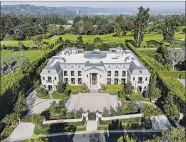  ?? Hilton & Hyland ?? PROSECUTOR­S say this 33,652-square-foot home in L.A.’s Holmby Hills was bought with bribes paid to a powerful Armenian politician and his family.