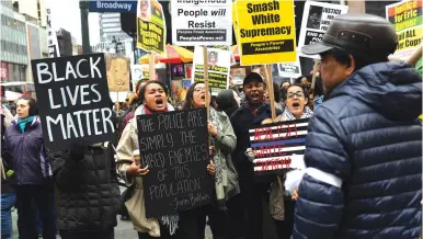  ?? (Darren Ornitz/Reuters) ?? ACTIVISTS ATTEND a Black Lives Matter protest against US President Donald Trump and New York Mayor Bill de Blasio in New York on Saturday. The author writes that intersecti­onality – the radical academic theory that holds all forms of social oppression...