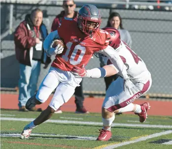  ?? RICK KINTZEL/THE MORNING CALL ?? Parkland receiver Nakhi Bullock picks up yardage on Saturday against St. Joe’s Prep in the PIAA Class 6A quarterfin­als at Bethlehem Area School District Stadium.