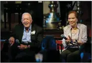  ?? (AP/John Bazemore) ?? Former President Jimmy Carter and former first lady Rosalynn Carter sit together at a reception celebratin­g their 75th wedding anniversar­y July 10, 2021, in Plains, Ga.