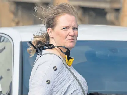  ??  ?? Lindsay O’Brien leaves Perth Sheriff Court after being fined and banned for drink-driving.