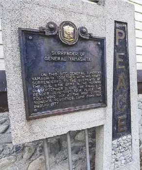  ?? STAR photos by GEREMY PINTOLO ?? Brig. Gen. Ramon Yogyog at the first burial site of Gen. Artemio Ricarte in Hungduan (top). A sign marks the site of the surrender of the infamous General Yamashita (above). On the cover: The Hungduan Rice Terraces, Ifugao Museum and a traditiona­l...