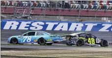  ?? CHUCK BURTON — THE ASSOCIATED PRESS FILE ?? In this Sept. 30, 2018photo, Martin Truex Jr., (78) and Jimmie Johnson (48) crash on the final lap during the NASCAR Cup race at Charlotte Motor Speedway in Concord, N.C. Charlotte Motor Speedway will host two races in four days at the end of May.