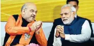  ?? PTI ?? PM Narendra Modi and BJP President Amit Shah at a felicitati­on function after the party's win in Gujarat and Himachal Pradesh Assembly elections