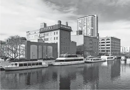  ?? JOVANNY HERNANDEZ / MILWAUKEE JOURNAL SENTINEL ?? Boats are seen docked on the Milwaukee River near State Street. That section of the Milwaukee River is inside the Republican National Convention security zone.