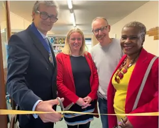  ?? Picture: Ji-Min Lee ?? OPEN TO SERVE: From left: Simon Muir, High Sheriff of the Royal County of Berkshire; Cllr Rachel Eden; Andy Dickens, director of
Faith Christian Group; and Cllr Alice-MpofuColes took part in the official opening of the new Whitley Wood community pantry.