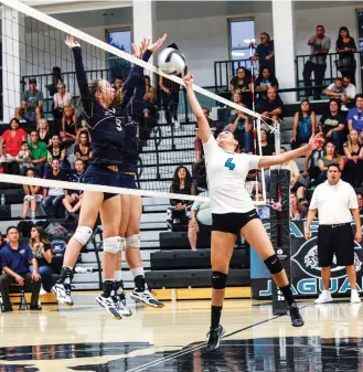  ?? PHOTOS BY GABRIELA CAMPOS/THE NEW MEXICAN ?? From left, Santa Fe High’s Leila Pierpont and Salome Romp go up against Capital’s Maya Wero during Wednesday’s game at Capital High School.