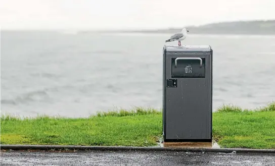  ?? SIMON O’CONNOR/STUFF ?? The bins have a solar compactor, which means they don’t fill up as fast.