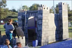  ?? Ryan Mancini/The Signal (See additional photos at signalscv.com) ?? Dennis Ramirez adds a drawbridge to his castle at this year’s Box City at Valencia Heritage Park on Saturday. The event is a fundraiser for Family Promise of SCV.