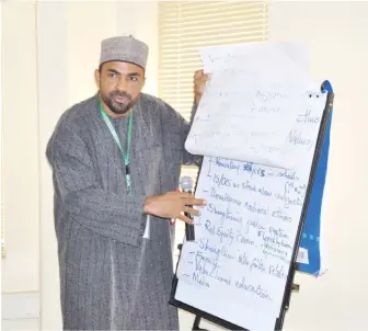  ??  ?? Alhaji Nurudeen Lemu explaining a point to members of the Committee on Religion, during a meeting in Abuja yesterday.