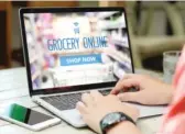  ?? DREAMSTIME/TNS ?? While grocery shopping online can be easy, be aware of potential downsides.