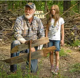  ??  ?? John Lithgow (left) and Jeté Laurence in “Pet Sematary”