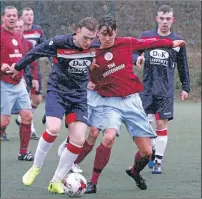  ?? Photo: Stephen Lawson ?? Saints hat-trick hero Shaun MacInver takes on the Woodhall defence.