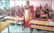  ?? HT FILE PHOTO ?? A teacher with her students in a classroom at a government primary school in Prayagraj.