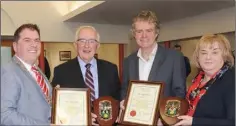  ??  ?? Cllr. Liam Reilly, Cathaoirle­ach of Louth County Council and Joan Martin, Chief Executive, Louth County Council make a presentati­on to Cllr. Peter Savage and Cllr. Mark Dearey.