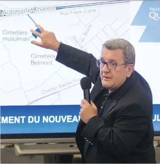  ?? JACQUES BOISSINOT/THE CANADIAN PRESS ?? Quebec City Mayor Regis Labeaume announced Friday the establishm­ent of a Muslim cemetery on a 6,000-squaremetr­e parcel of land. It is expected to be ready this fall.