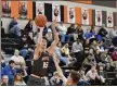  ?? PAUL DICICCO — FOR THE NEWS-HERALD ?? Mentor’s Caleb Piks shoots Jan. 21 at North.