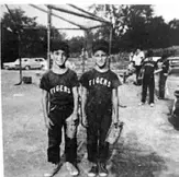  ??  ?? Bob Mariano, left, and his brother, Jack, posed for a picture at the ballfield in Mooncrest.