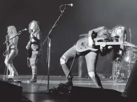  ?? WAYNE PARRY AP ?? From left, bassist Ashley Suppa, singer-guitarist Moriah Formica and lead guitarist Bella Perron of the rock group Plush, perform at the Tropicana casino in Atlantic City, N.J., on March 11. The all-female band from upstate New York has been winning new fans by touring with some of the biggest bands in rock.