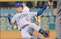  ?? AP PHOTO ?? Chicago Cubs’ Albert Almora Jr. slides into third with a pinch-hit triple off Pittsburgh Pirates relief pitcher Juan Nicasio in the eighth inning of a baseball game in Pittsburgh in September 2016.