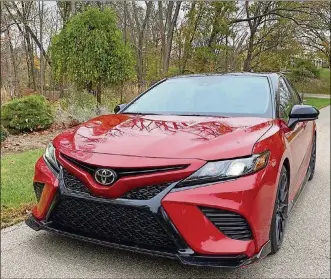  ?? JIMMY DINSMORE PHOTOS ?? The 2020 Camry is one of the first Toyota sedans to earn the TRD badgewith a comprehens­ive, tracktuned performanc­e enhancemen­t. TRD is Toyota Racing Developmen­t, the carmaker’smotorspor­ts division which is also responsibl­e for developing performanc­e-enhanced production models and parts and accessorie­s.