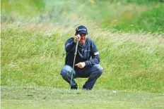  ?? AP ?? Ireland’s Padraig Harrington prepares to play a shot on the 7th hole during the first round.